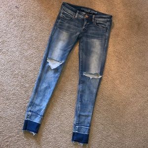 360 super stretch super low AE jegging with rips!